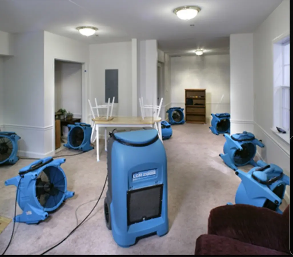 Air movers and dehumidifier setup for Water Damage Restoration in Framingham